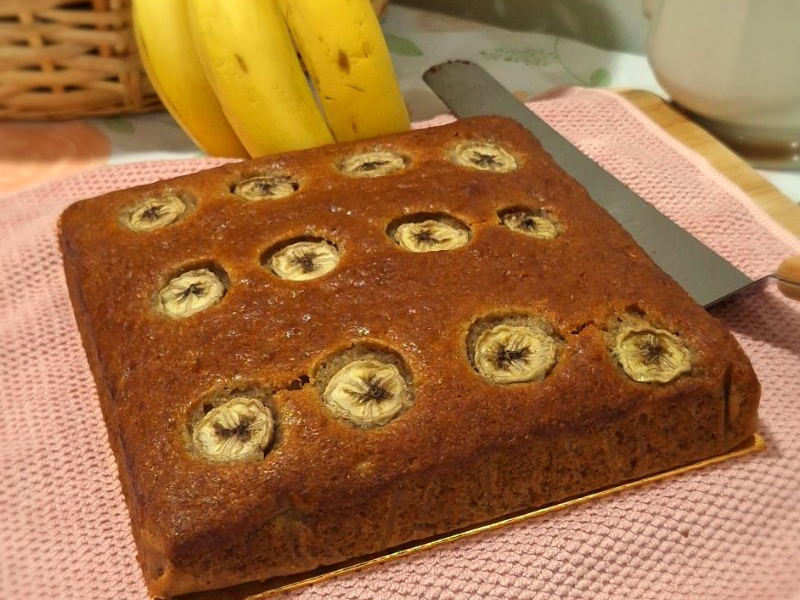 Plain banana cake topped with caramelised banana slices